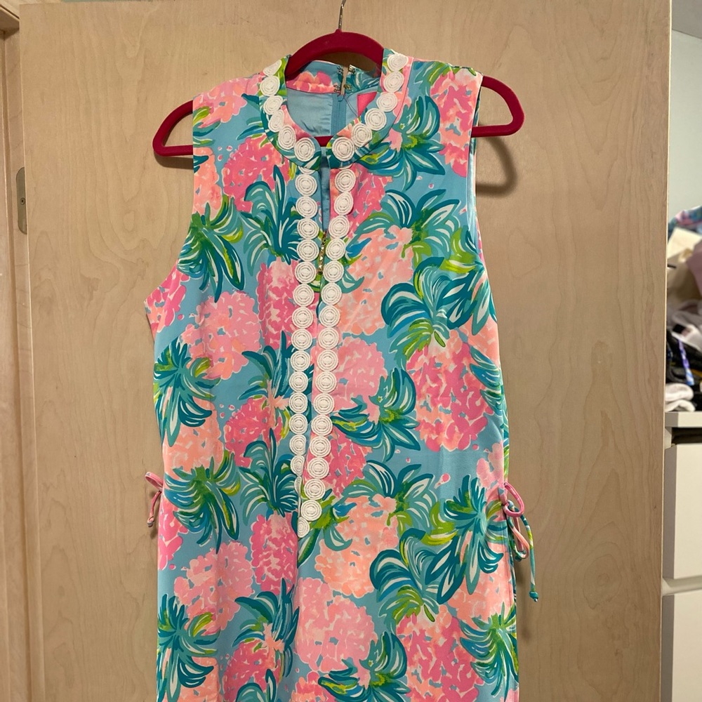 Lily romper. NWT.